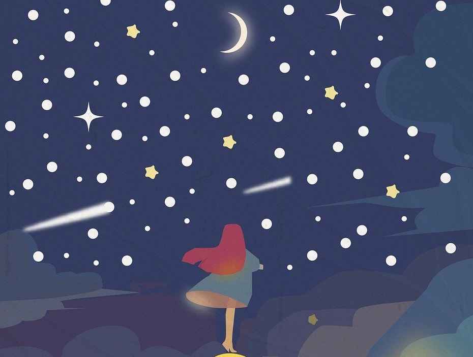 Fille rousse sous étoiles